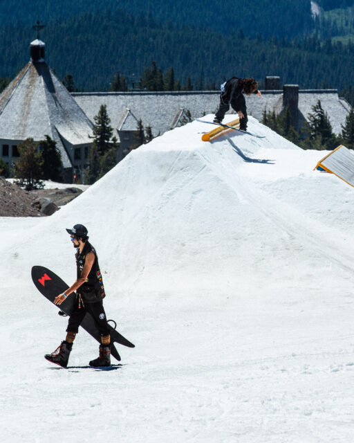 Mile Fallon hits a tube on his snowboard